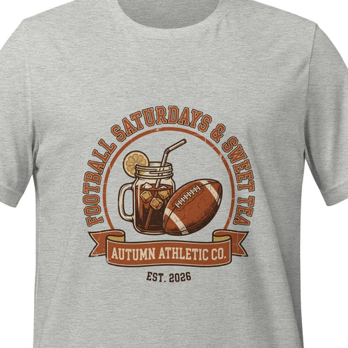 Athletic heather unisex t-shirt printed with a circular badge reading Football Saturdays and Sweet Tea, arched around a mason jar of iced sweet tea beside a football